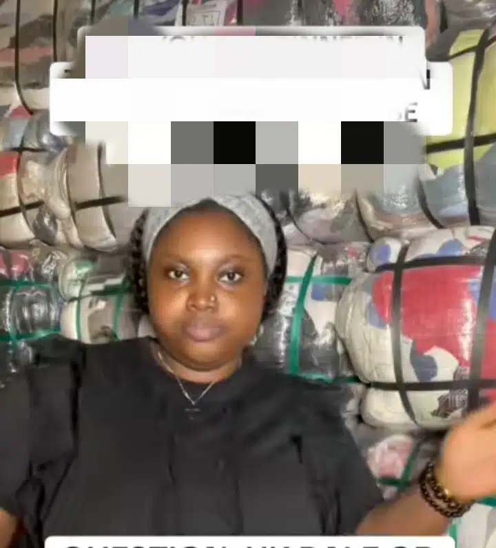 Thrift vendor rants as she finds sign-out shirt inside imported bale of clothes 