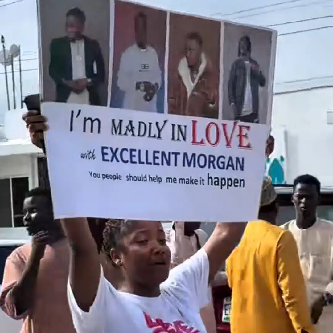 Nigerian lady raises eyebrows with a large poster professing her love for a man in Lagos