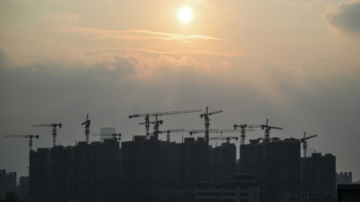 China admits economy facing new 'problems', vows to fix property sector