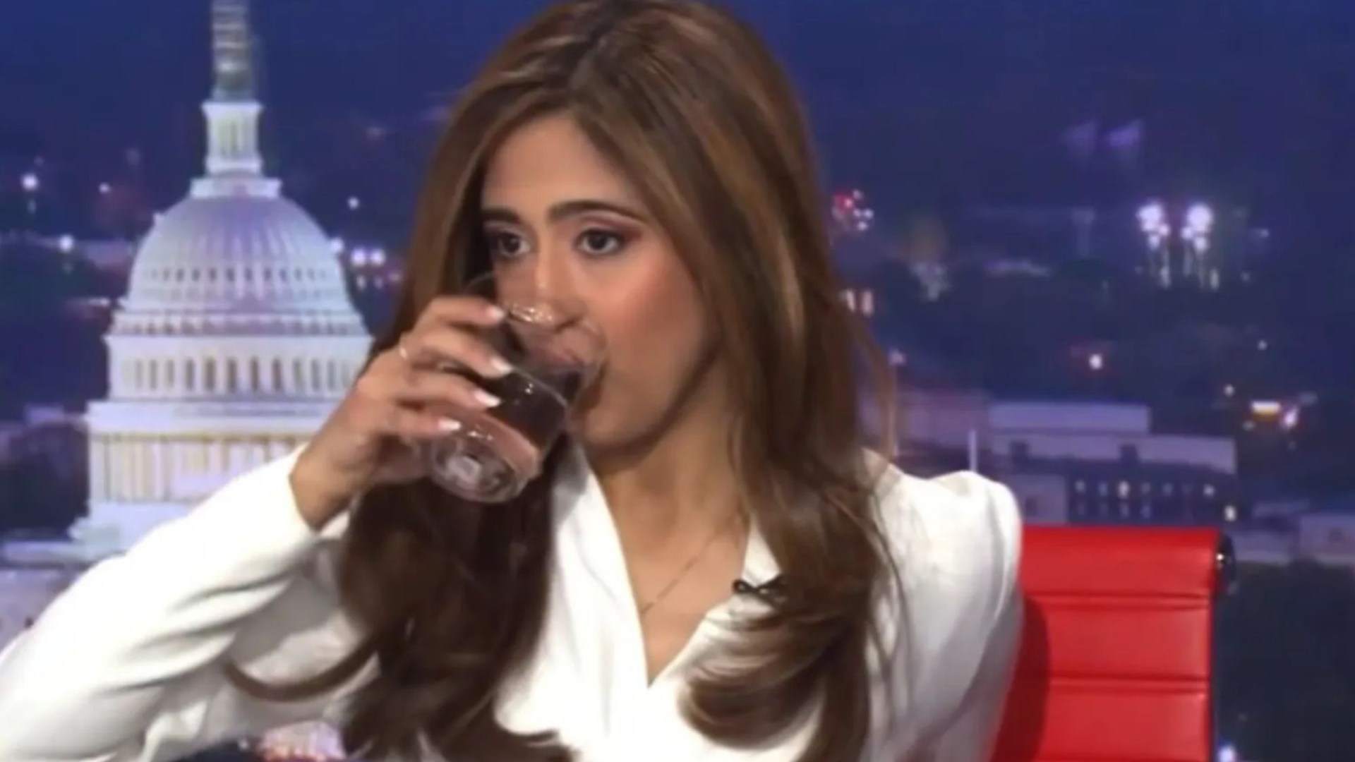 Watch the mortifying moment BBC News presenter is caught downing a drink and pulling faces at camera in major blunder