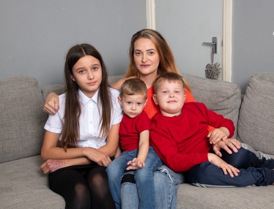 Cora, Adley and Addison with mum - she spends thousands on phones for them a year