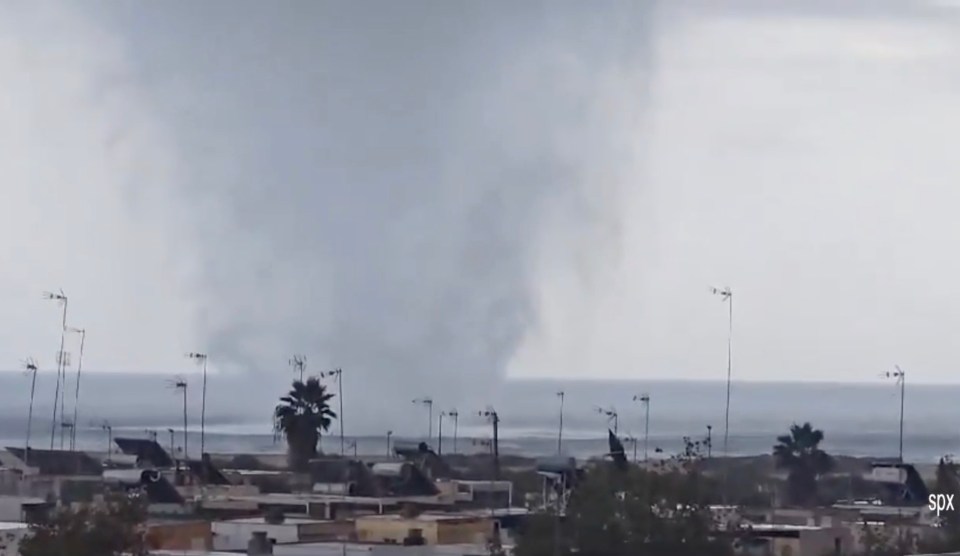 Unbelievable footage shows the water rise and swirl amid flash floods in Spain