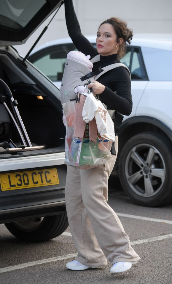 The new mum looked great on a trip to the shops with her daughter