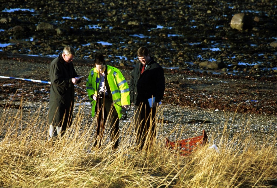 Officers at Barassie Beach in December 1999 after the discovery of a severed head