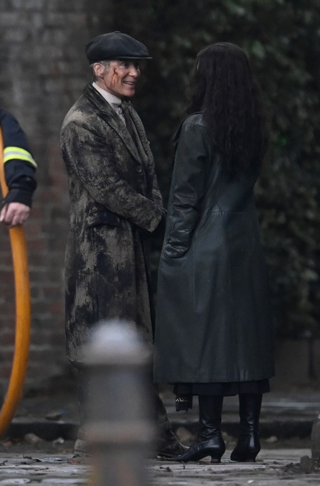 He sported a bloody face as he chatted with Rebecca Ferguson in between takes