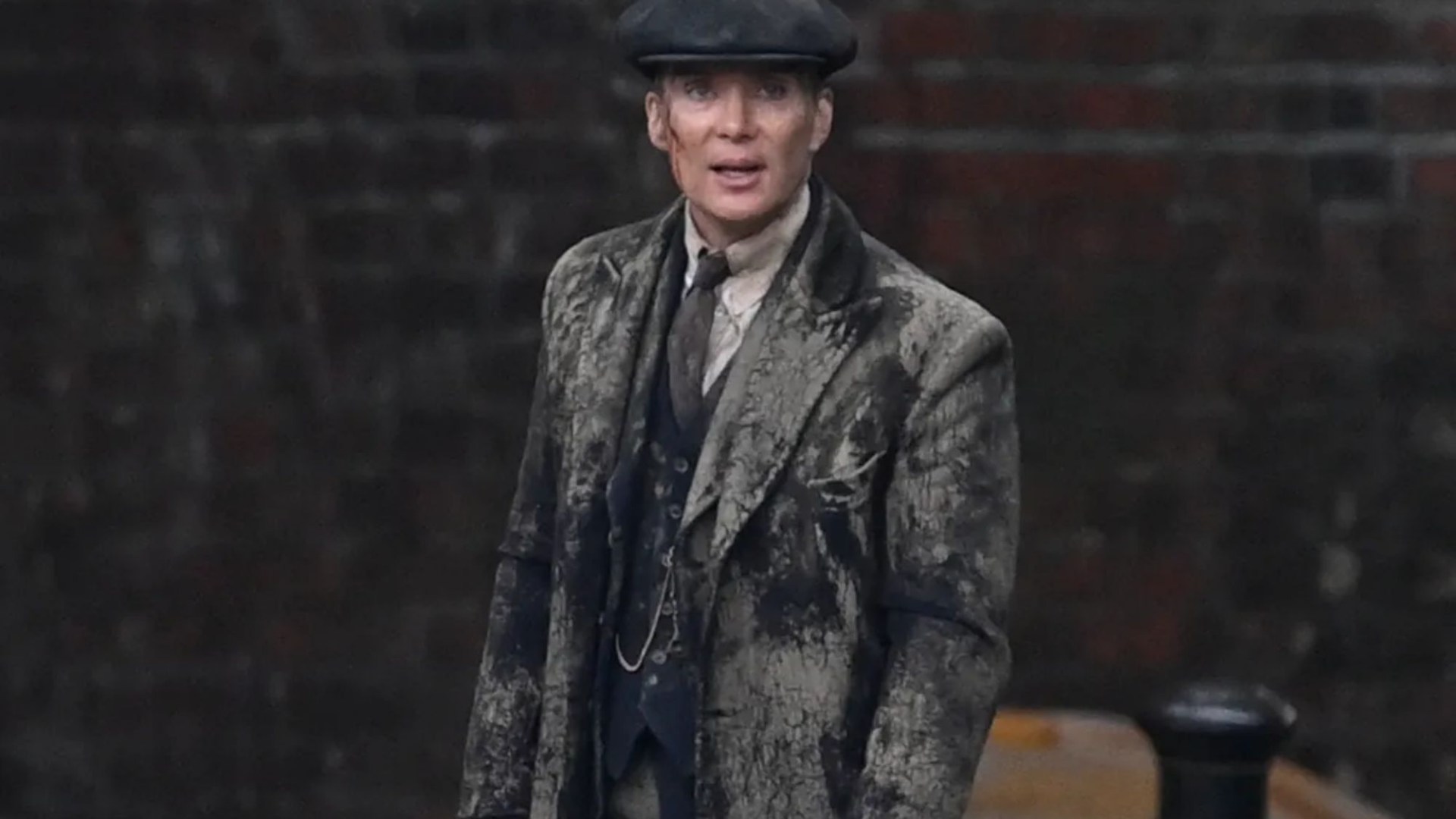 Cillian Murphy bloodied and bruised as he films Peaky Blinders as Tommy Shelby in Birmingham