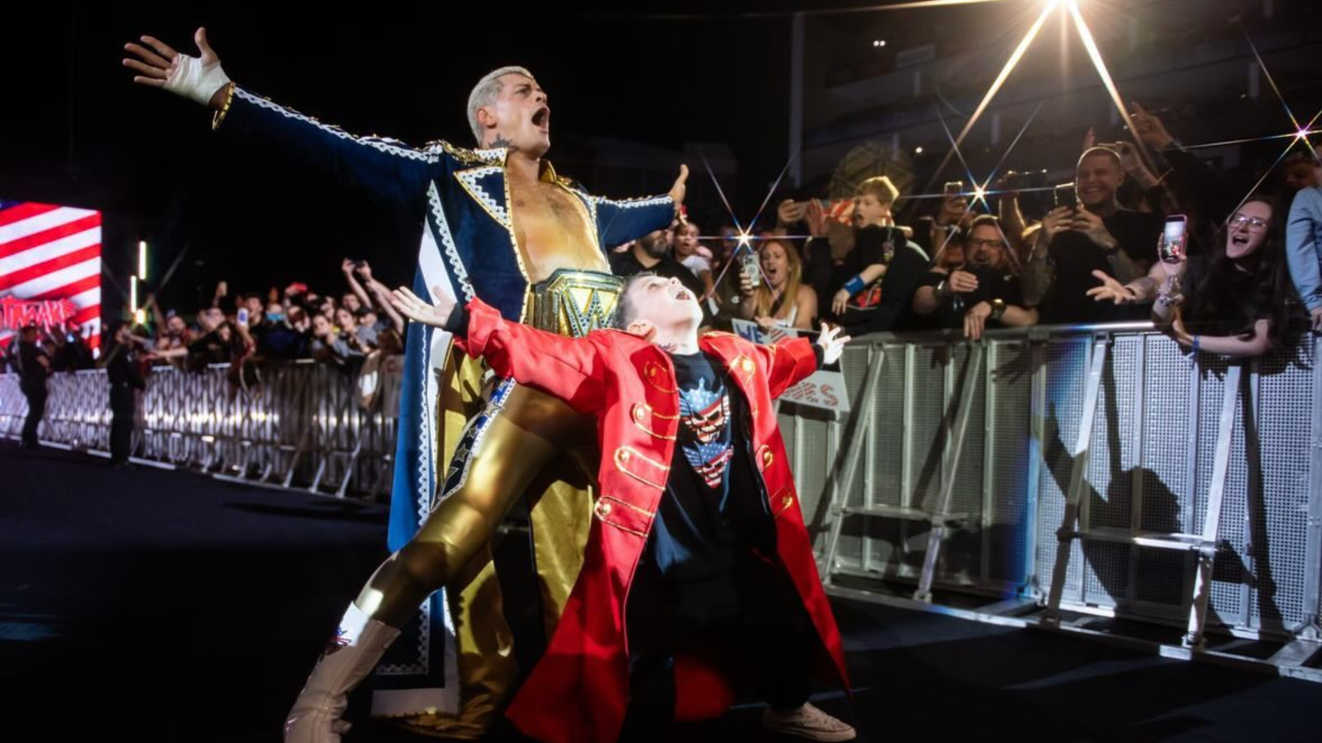 Adorable moment WWE Champion picks Scotland hero's son from the crowd to join him for his sparkling trademark entrance