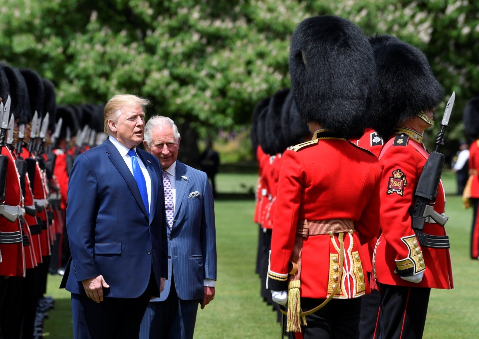 Trump and the The Prince of Wales inspecting the Guard of Honour during a Ceremonial Welcome at Buckingham Palace in 2019