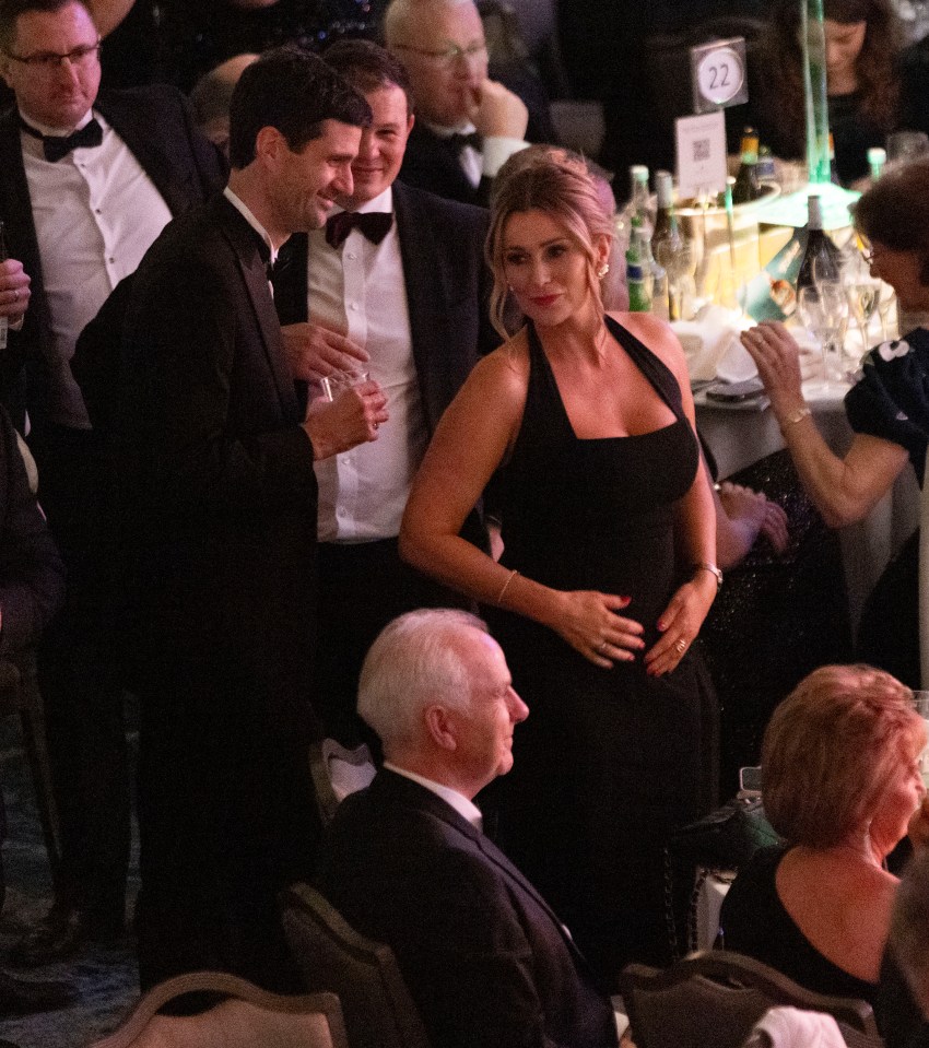 Katie was dressed in a black gown, as he hosted the Irish Post Awards in London on Thursday