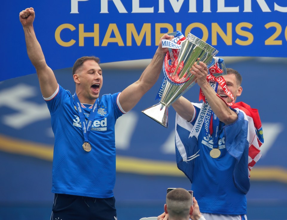 Nikola Katic and Borna Barisic with the Premiership title