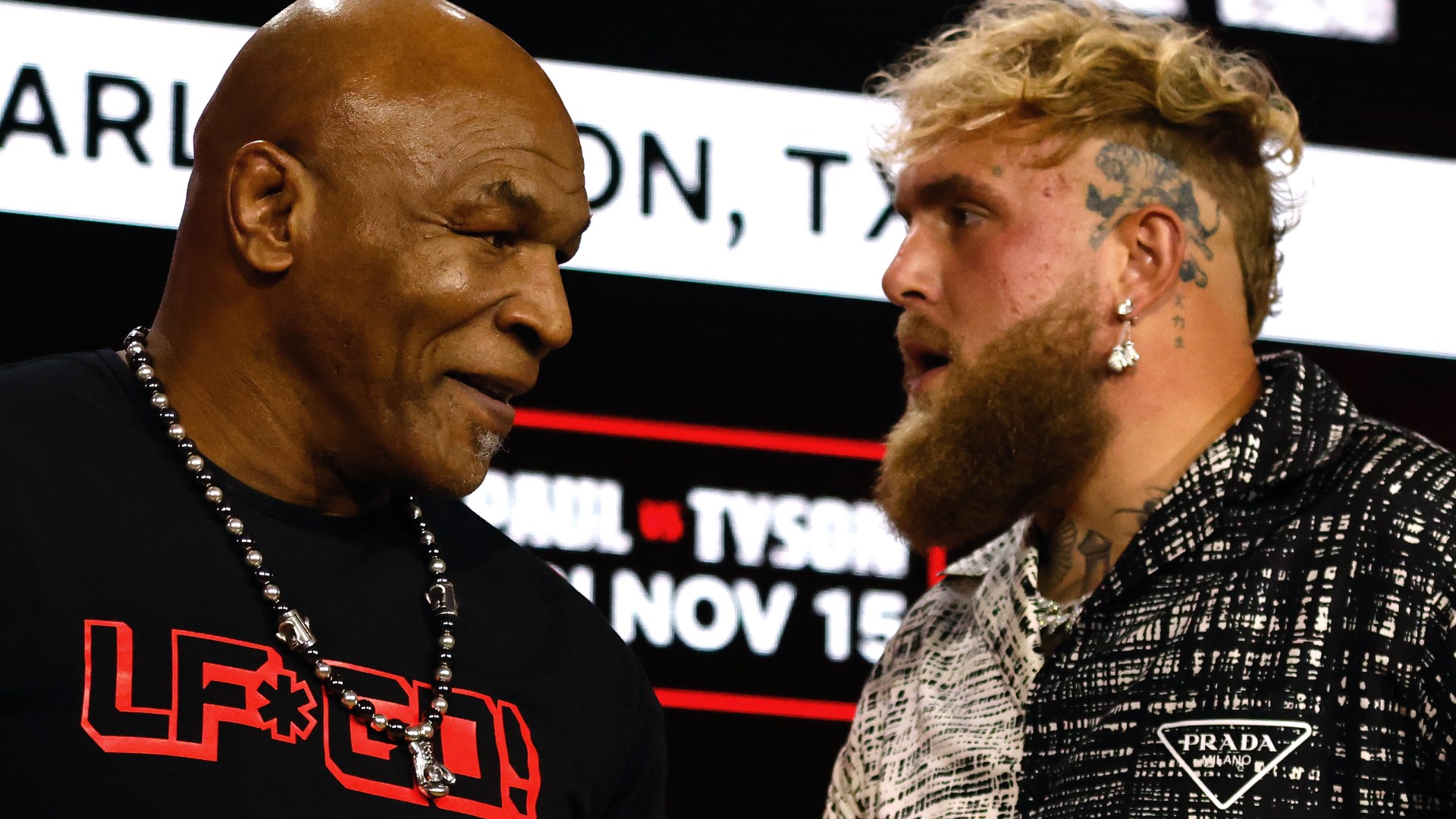 Mike Tyson tells Jake Paul ‘I’ll feed it to my falcon’ after being presented with bizarre gift in pre-fight face-off – The Scottish Sun