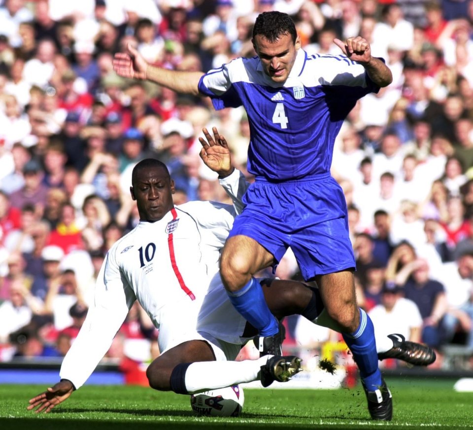 Dabizas tackles Emile Heskey in the 2001 qualifier