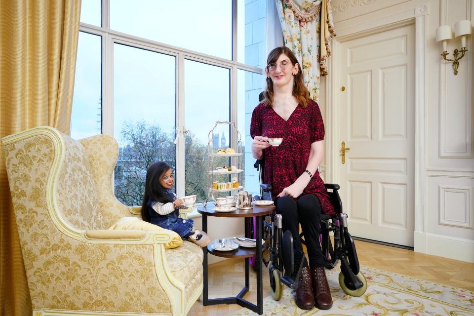 The world's tallest and shortest women met for afternoon tea to mark Guinness World Record day