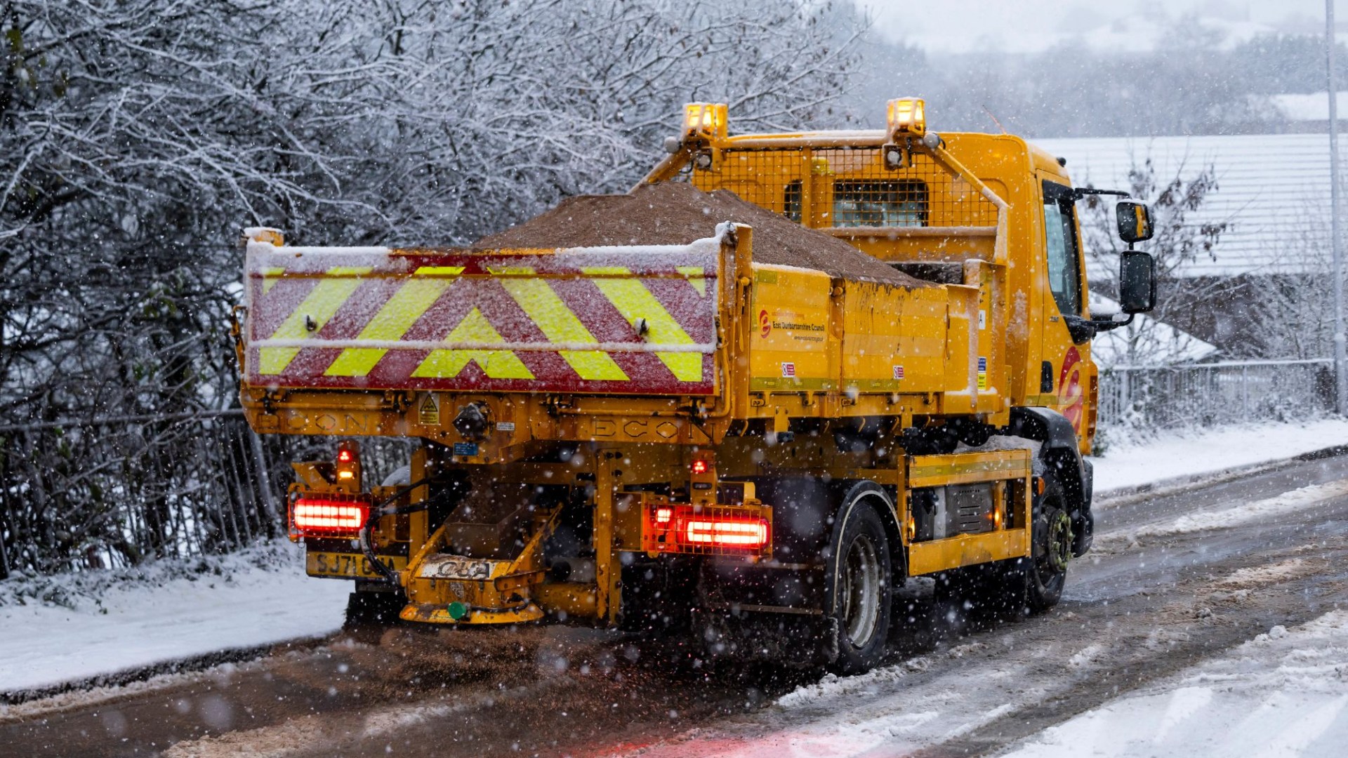 Major motorway grinds to a halt and bus, ferry and rail services axed as Storm Bert rages across Scotland