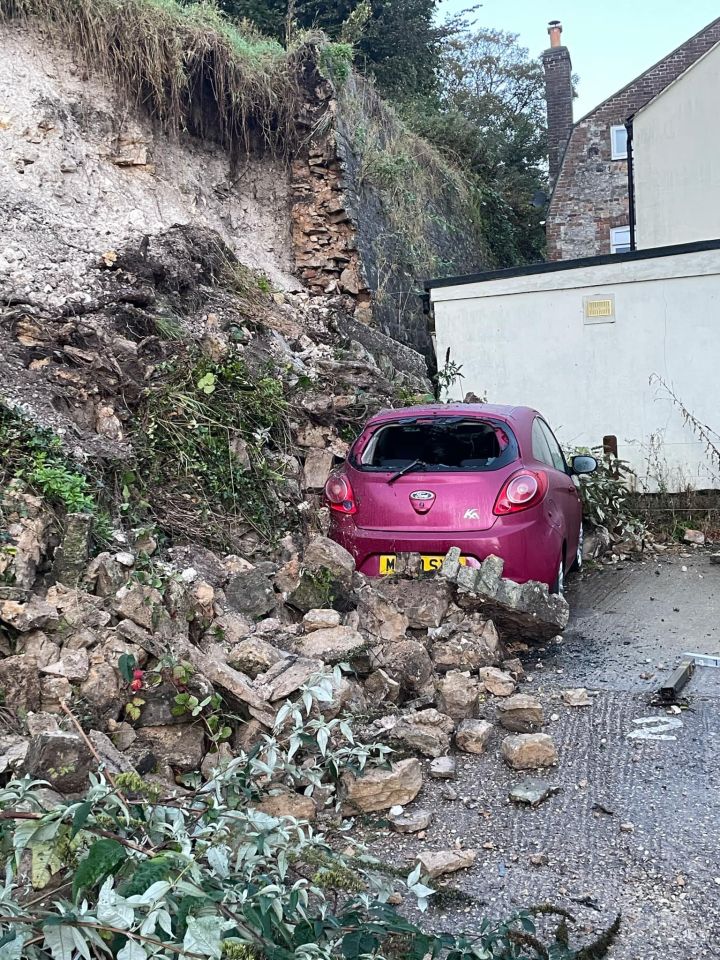 Part of a 13ft wall collapsed on her daughter's Ford Ka