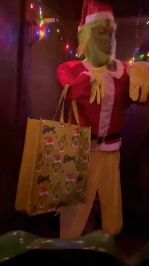 A 'grinch' with a bag for life stood at the end of the attraction