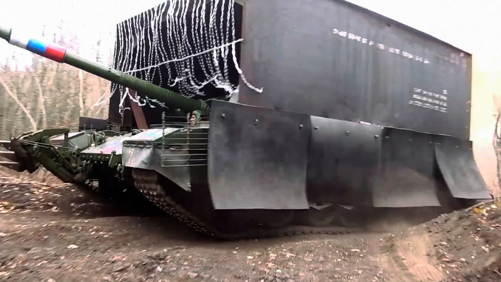 Putin deploys barmiest ‘turtle tanks’ yet as Soviet-era armour hits battlefield shielded by steel shed & chain fringe