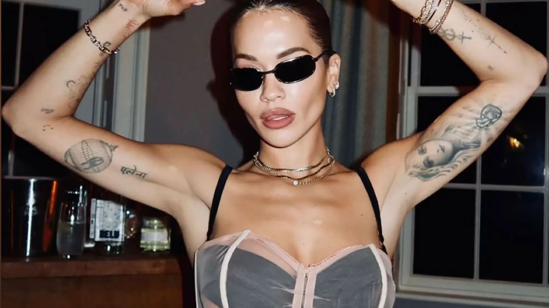 Rita Ora looks incredible as she flashes her underwear in daring see through dress to celebrate her birthday