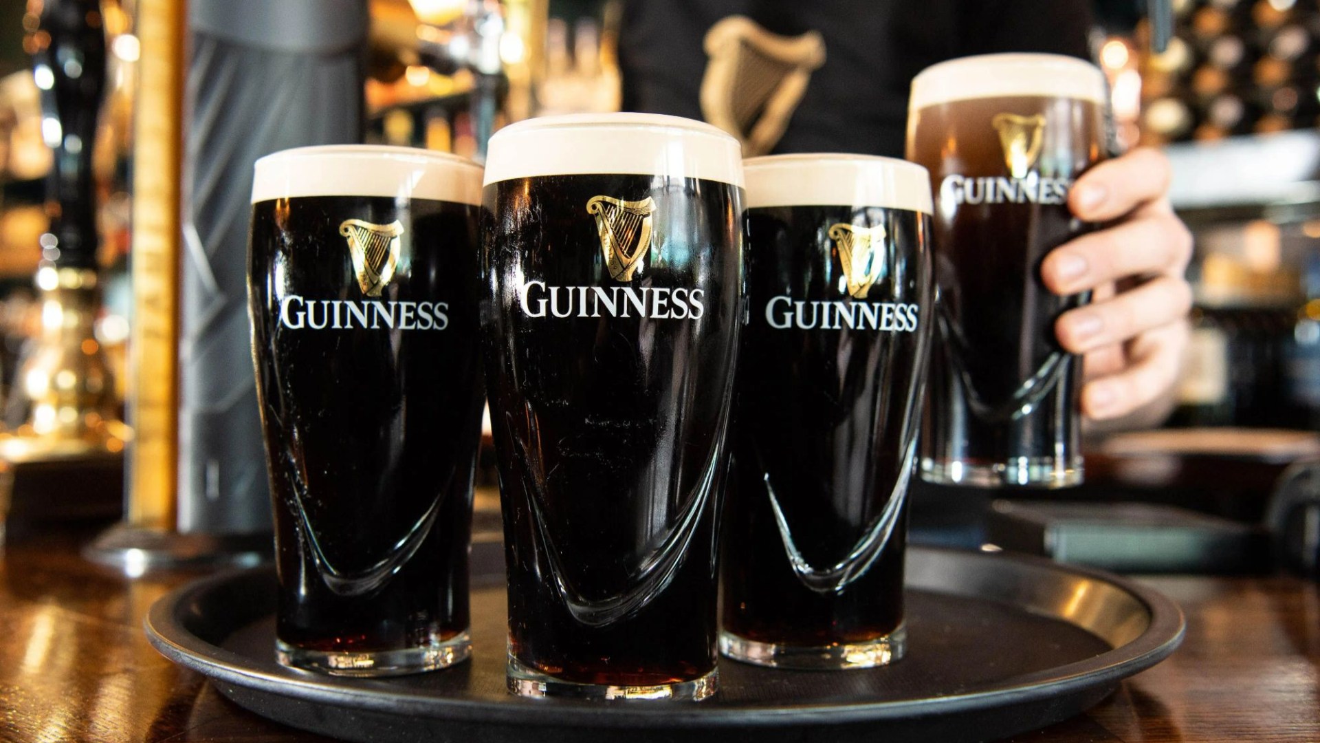 Fears pubs could RUN OUT of Guinness before Christmas as bosses hold crunch talks over 'surge in demand' for drink