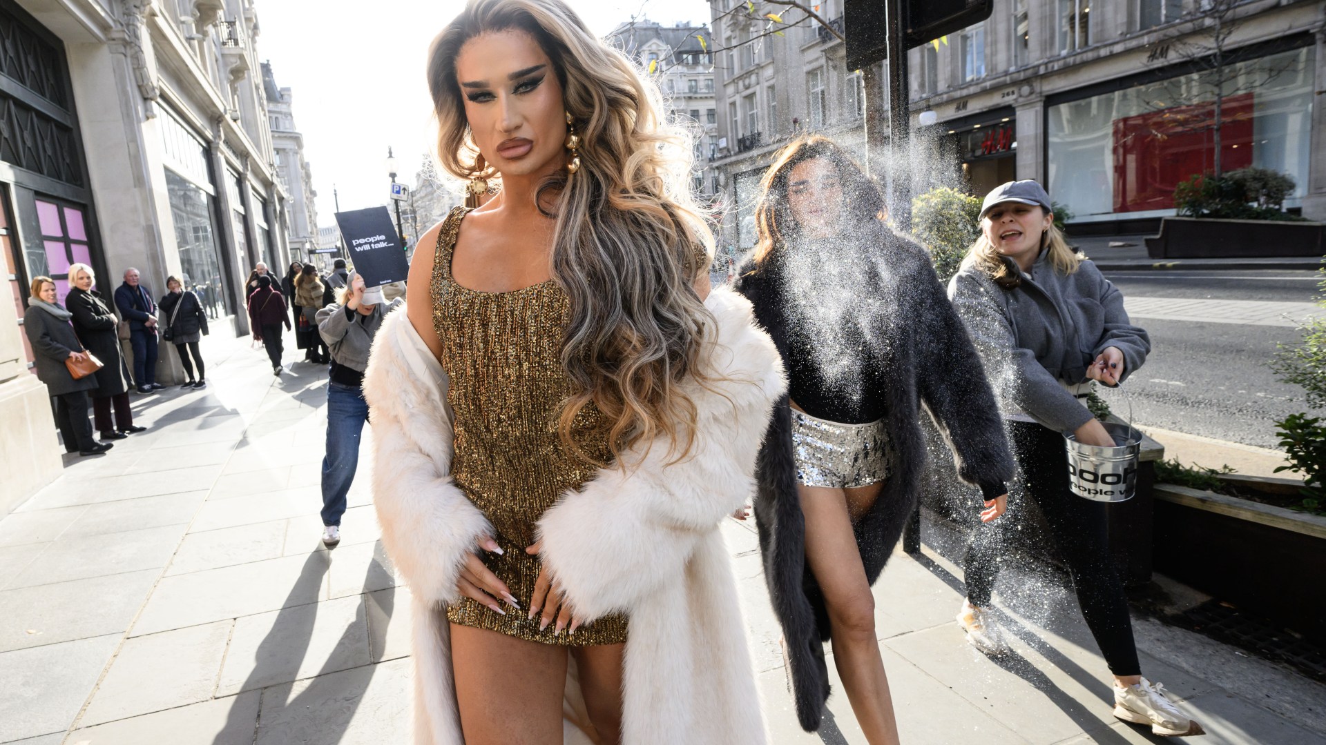 Drag Race UK star covered in buckets of glitter as Oxford Circus becomes a makeshift catwalk