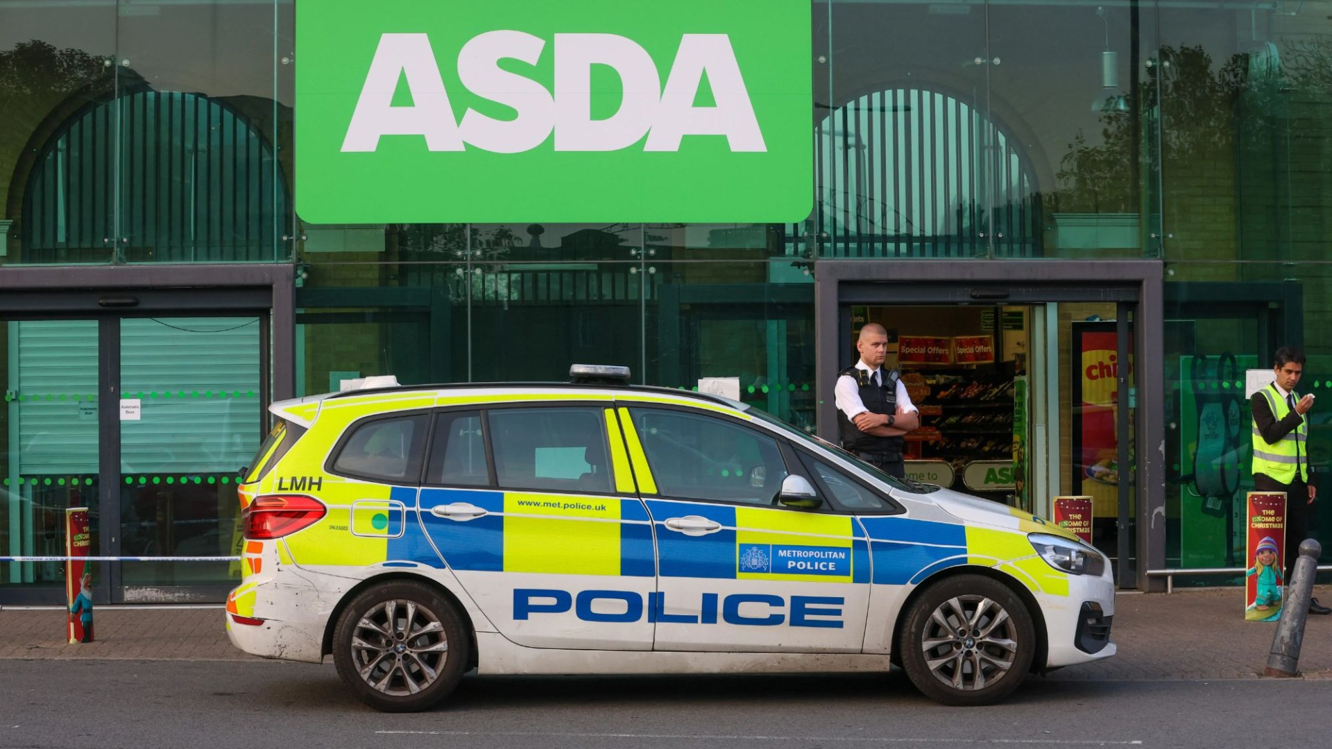 Man stabbed inside Asda in front of horrified shoppers and rushed to major trauma centre as cops seal off store