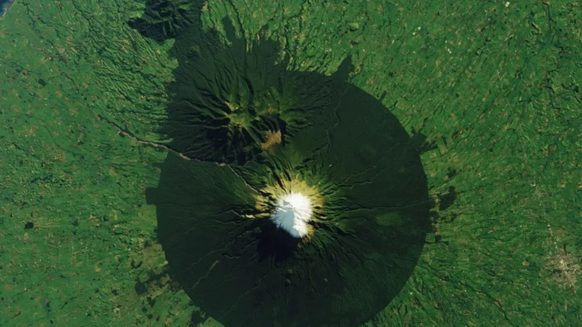 Mystery of perfectly circular invincible ‘Goblin Forest’ surrounding a sacred volcano in the land of Hobbits