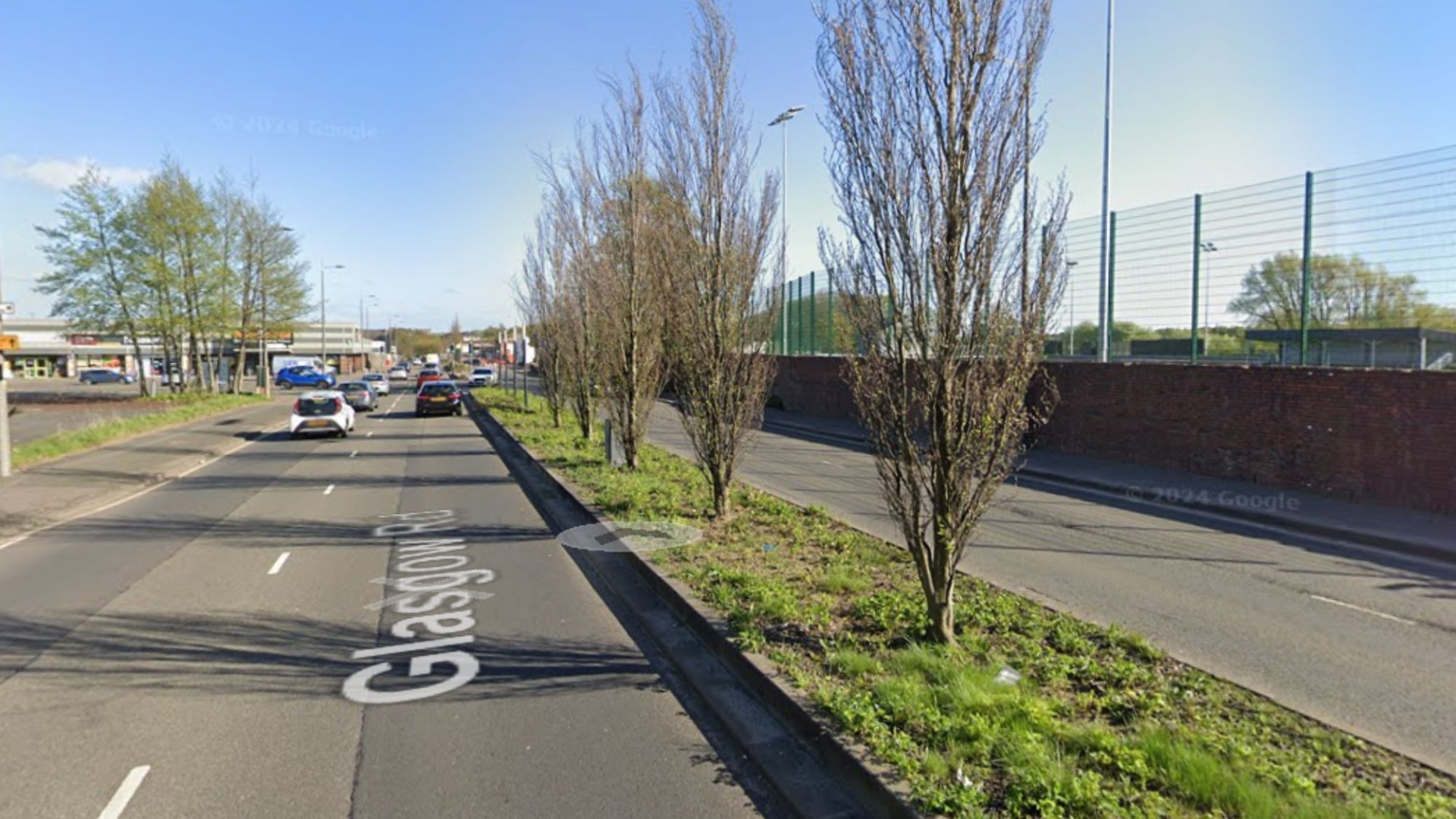 Pedestrian, 56, dies near Glasgow after horror crash on busy road