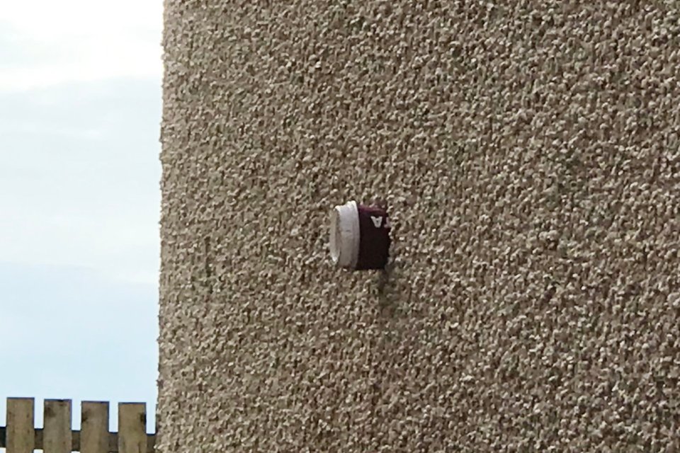 Shoddy builders stuck a Costa coffee cup in a ventilation hole on the side of his house