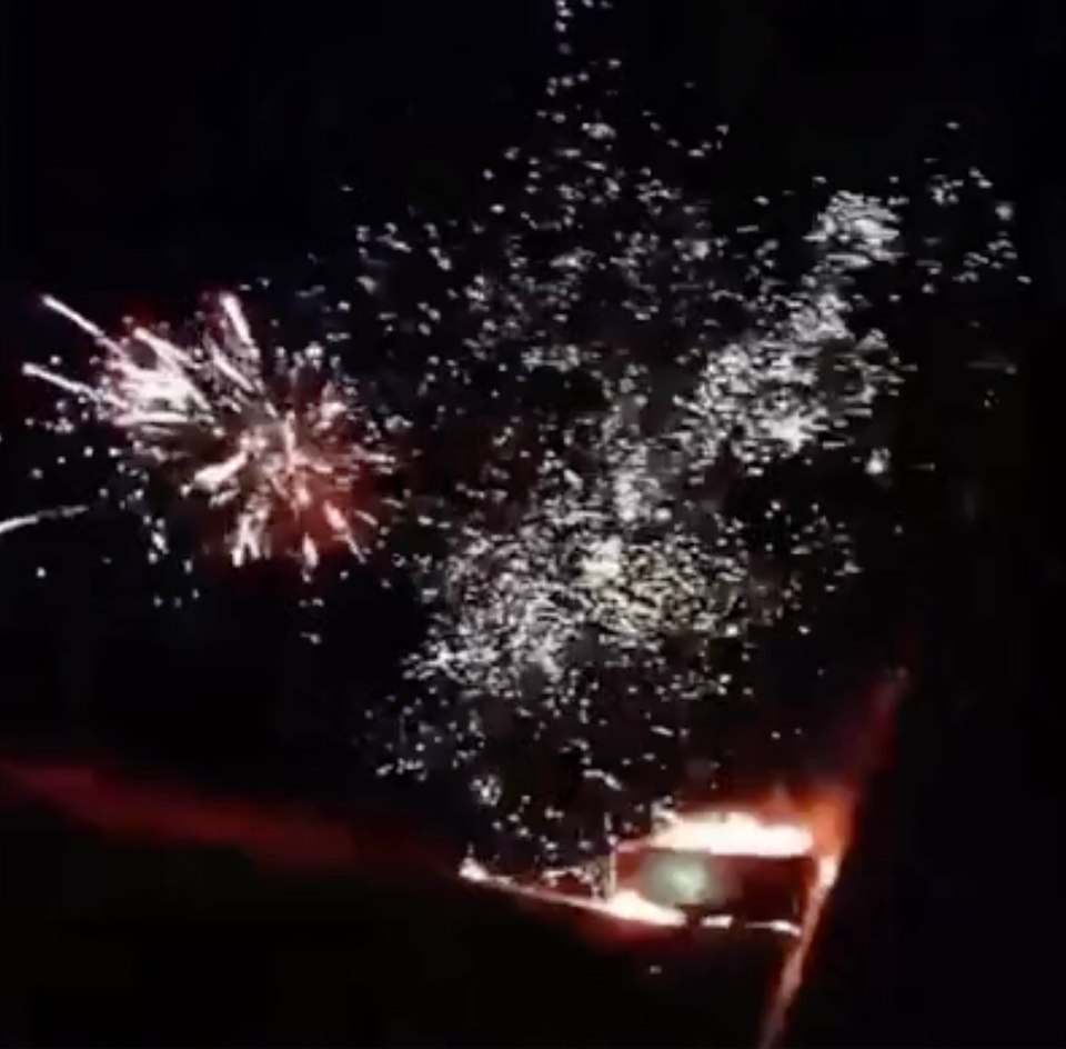 Fellow motorists stopped in the middle of the highway to watch the New Year show come early