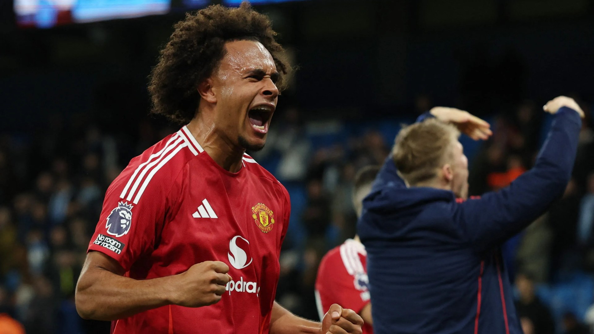 Joshua Zirkzee has to be pulled away after running back to GOAD crowd as Man Utd fans say 'I love you so much for this'