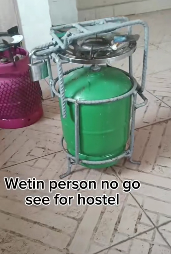 Student takes serious measures to secure gas cylinder as he returns to hostel