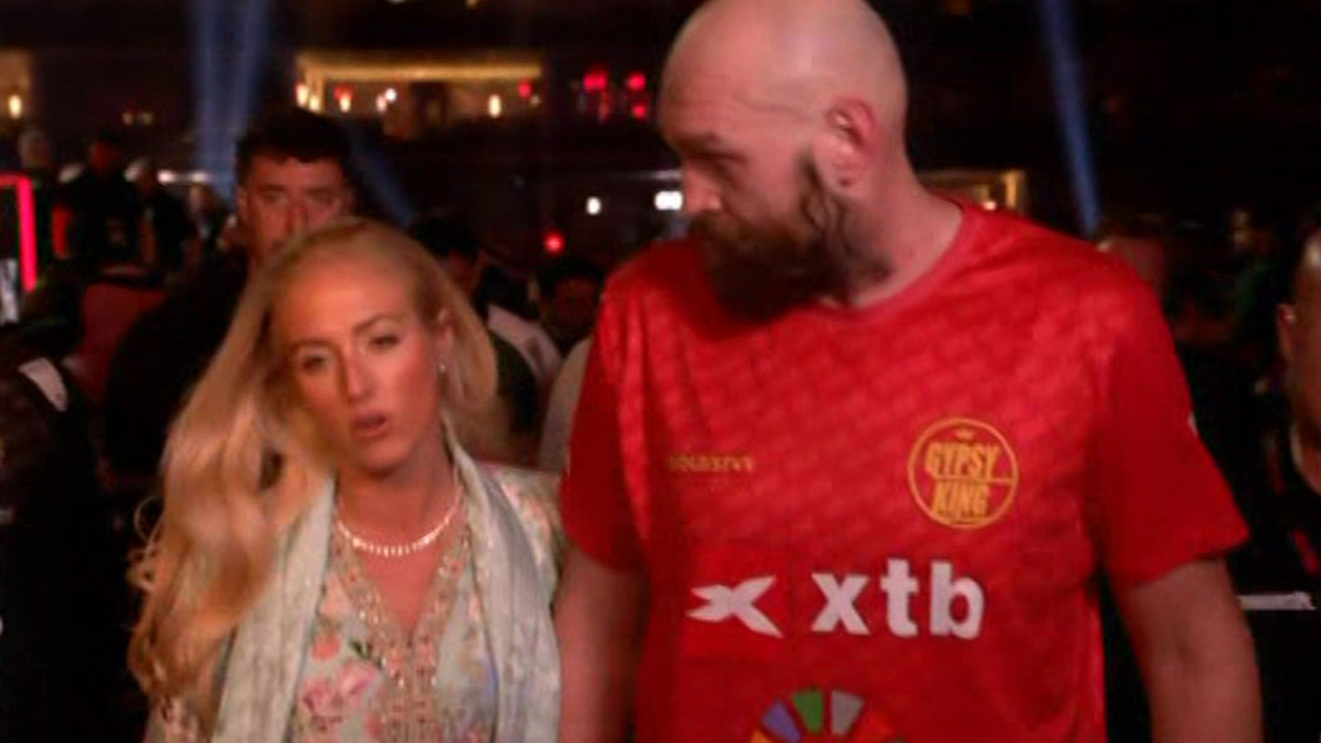 Devastated Tyson Fury consoled by wife Paris as he storms out of ring raging with Oleksandr Usyk defeat