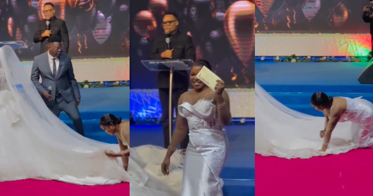 Pastor gifts bridesmaid ₦50,000 for being humble enough to adjust the bride's gown on her knees (VIDEO)