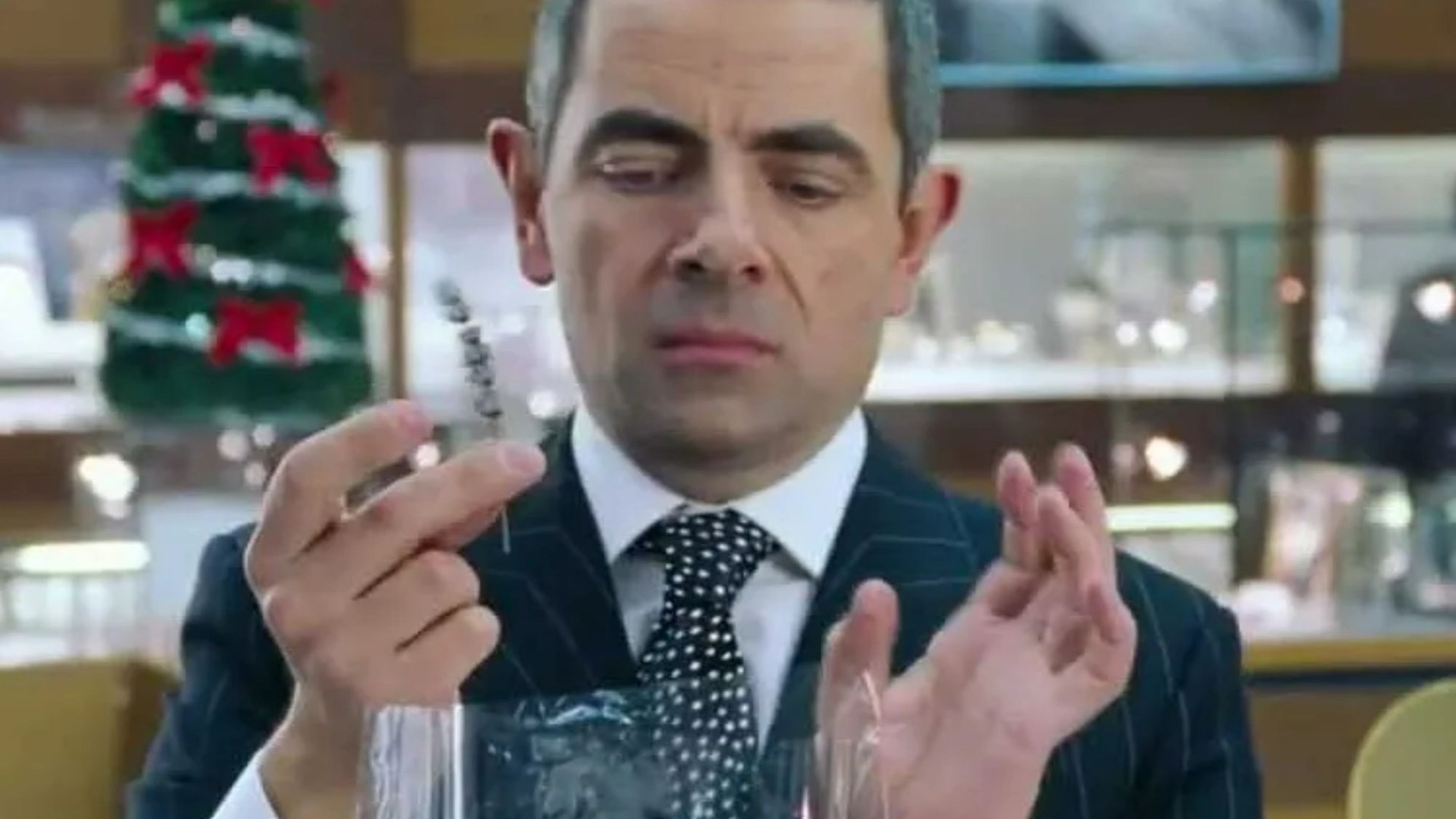 Love Actually fans are only just realising why it took Rowan Atkinson so long to wrap that necklace & more film secrets