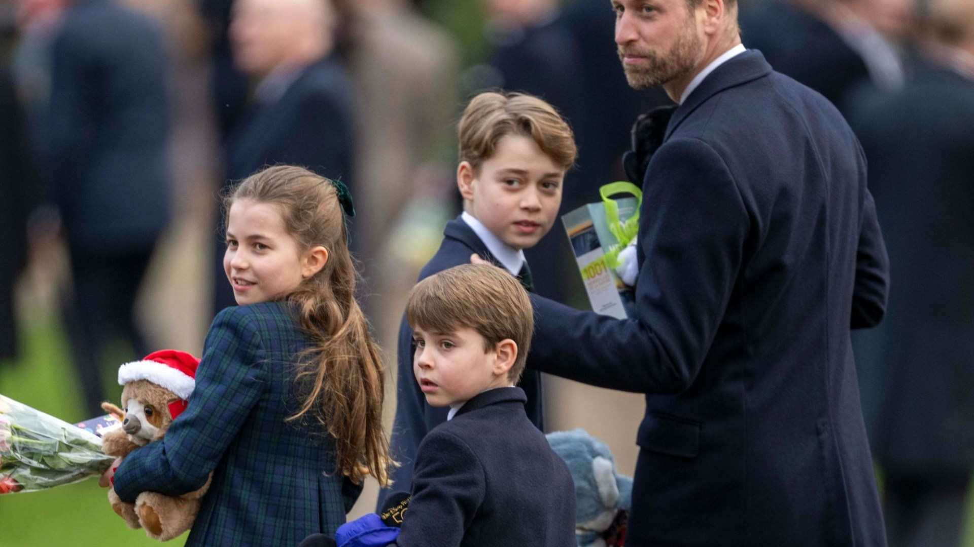 Prince Louis follows in football-mad dad Wills' footsteps as he sports Aston Villa shirt during kick-about with mum Kate