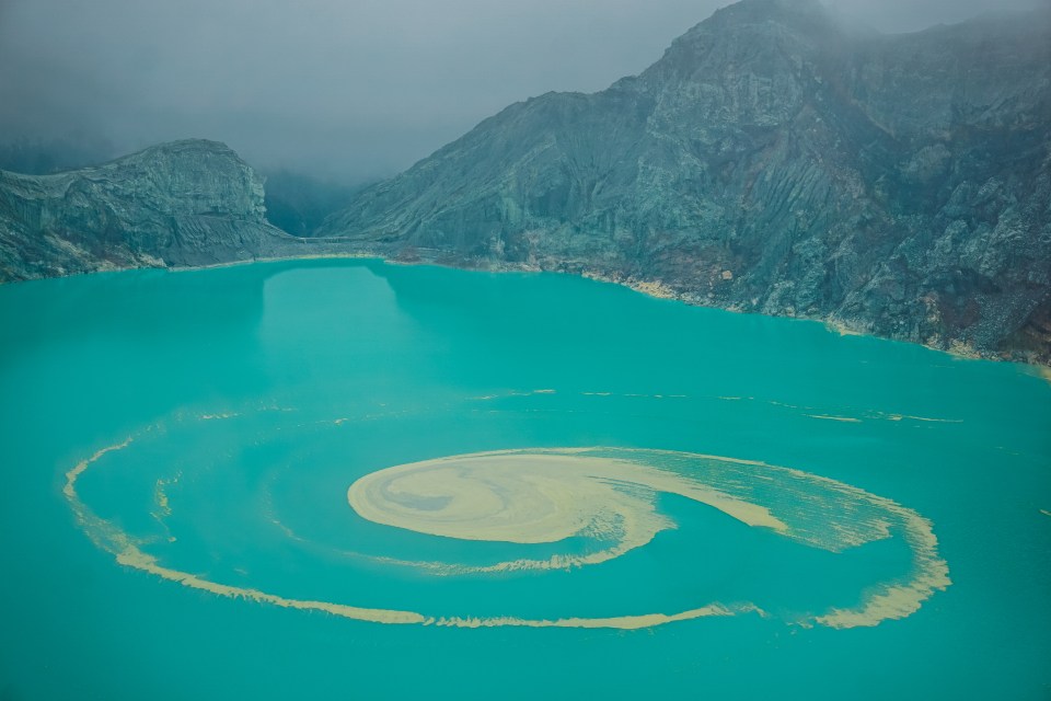 Ijen volcano crater lake in Indonesia