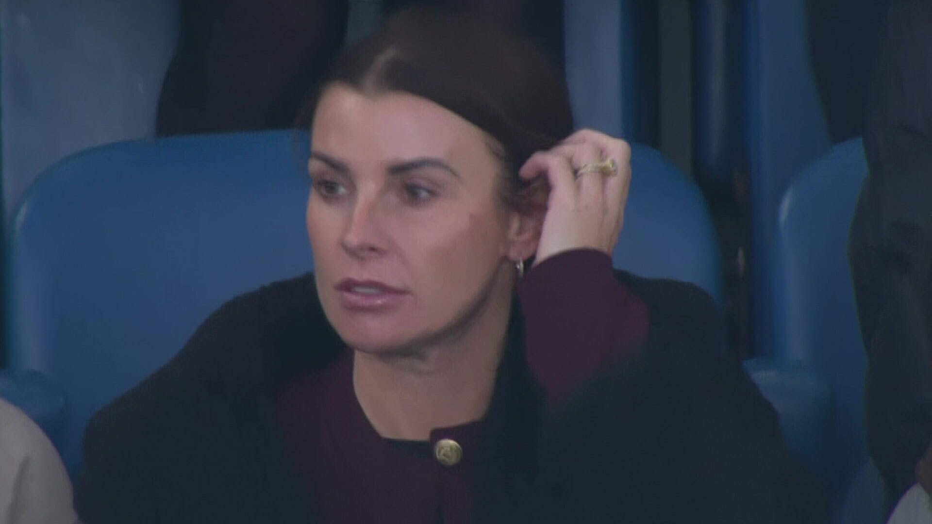 Coleen Rooney looks unimpressed as she watches on during Everton defeat... as husband Wayne loses again too