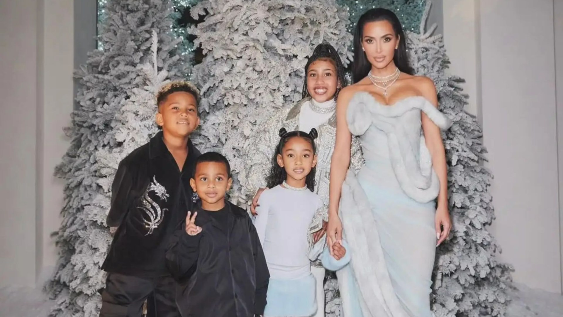 Kim Kardashian poses with all four kids in adorable Christmas photos as son Saint looks just like dad Kanye West