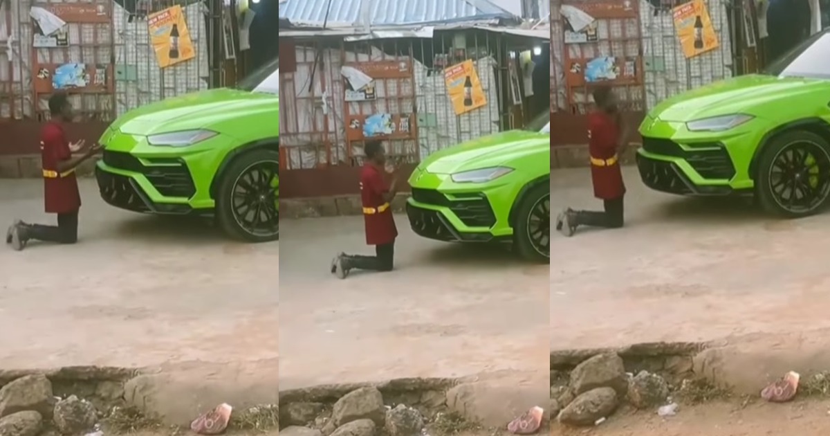 "If him no work nothing for am" – Man kneels down to pray for exotic car after spotting one on the street (WATCH)