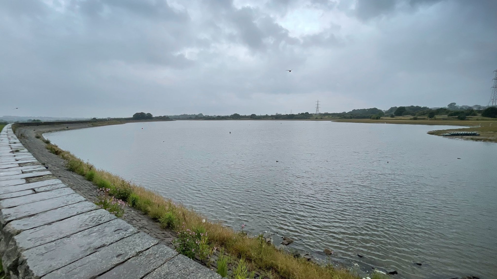 Body of unknown woman is pulled from reservoir after cops rushed to 'concern for welfare'