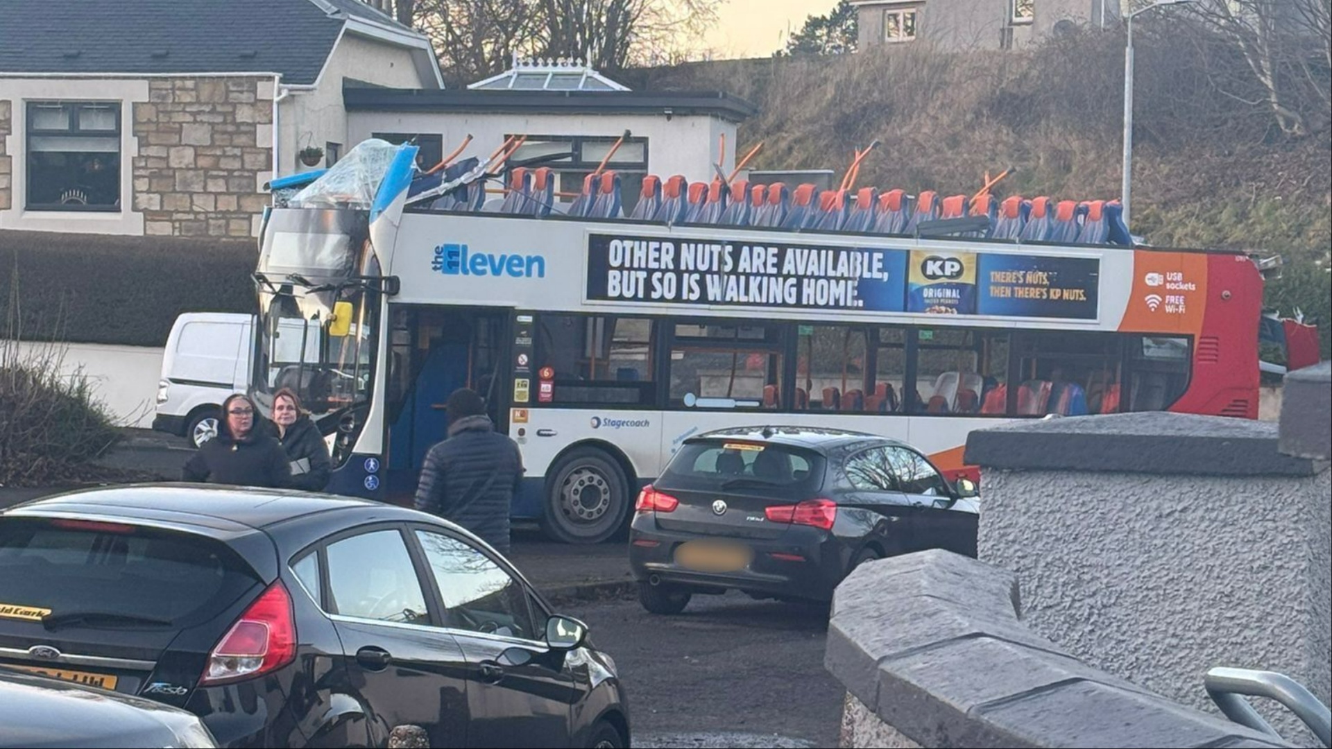 Double decker bus roof ripped off after crashing into bridge as Scots road locked down