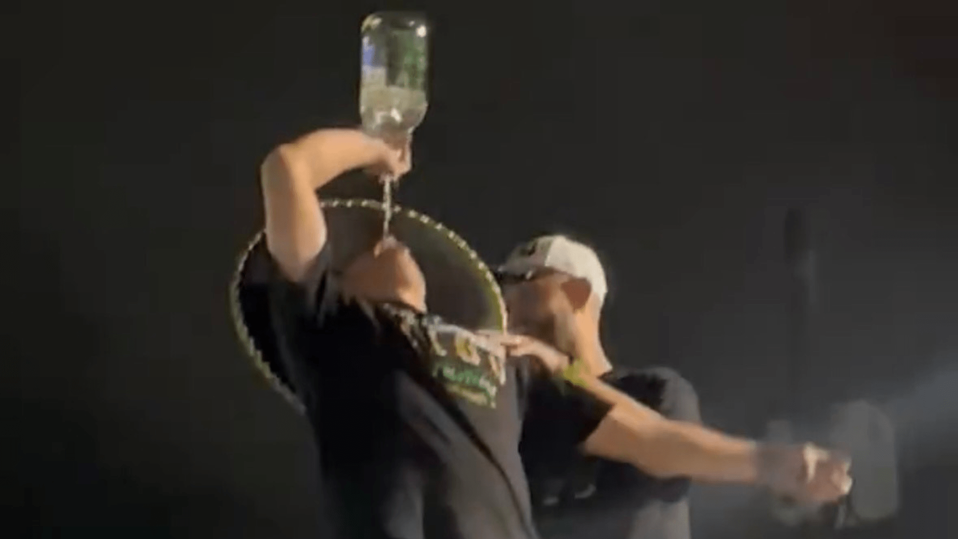 Former Celtic star spotted partying on top of bus wearing sombrero and knocking back high-strength booze after title win