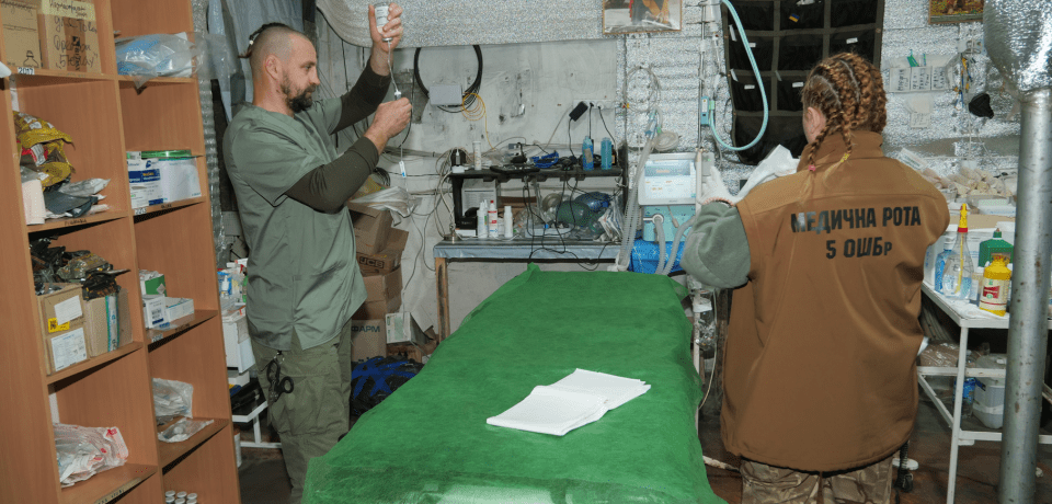 An empty bed in the field hospital ready to receive an inured soldier