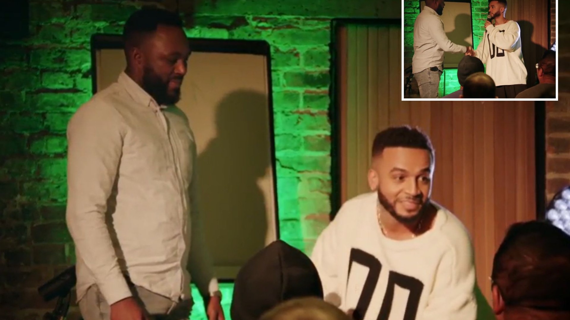 Watch shock moment JLS star Aston Merrygold drops to his knees and offers to suck a man's TOES in stomach-churning video