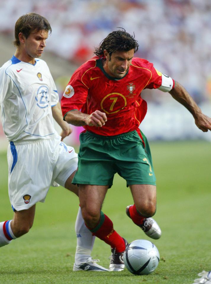 Bugayev, left, playing for Russia against Portugal icon Luis Figo at Euro 2004