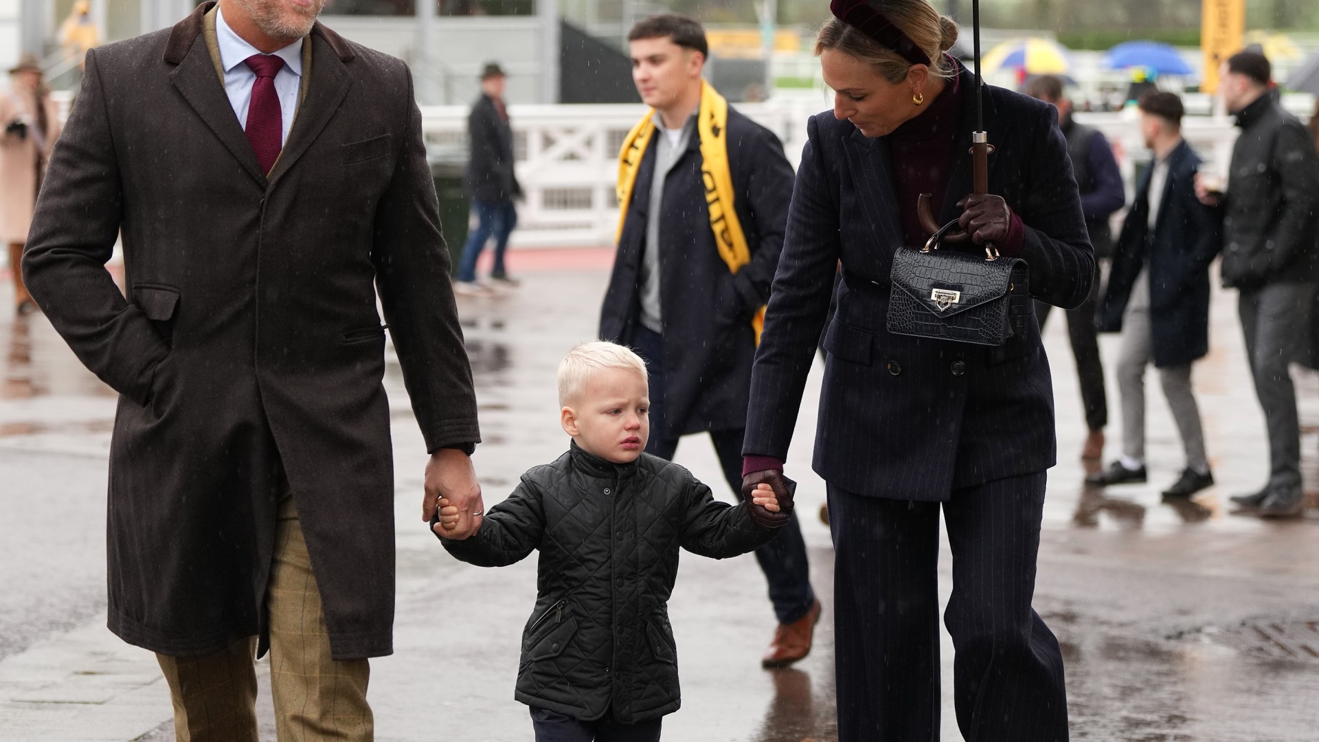 Zara & Mike Tindall’s rarely-seen son Lucas, 3, cheers on the horses in adorable snaps – The Scottish Sun