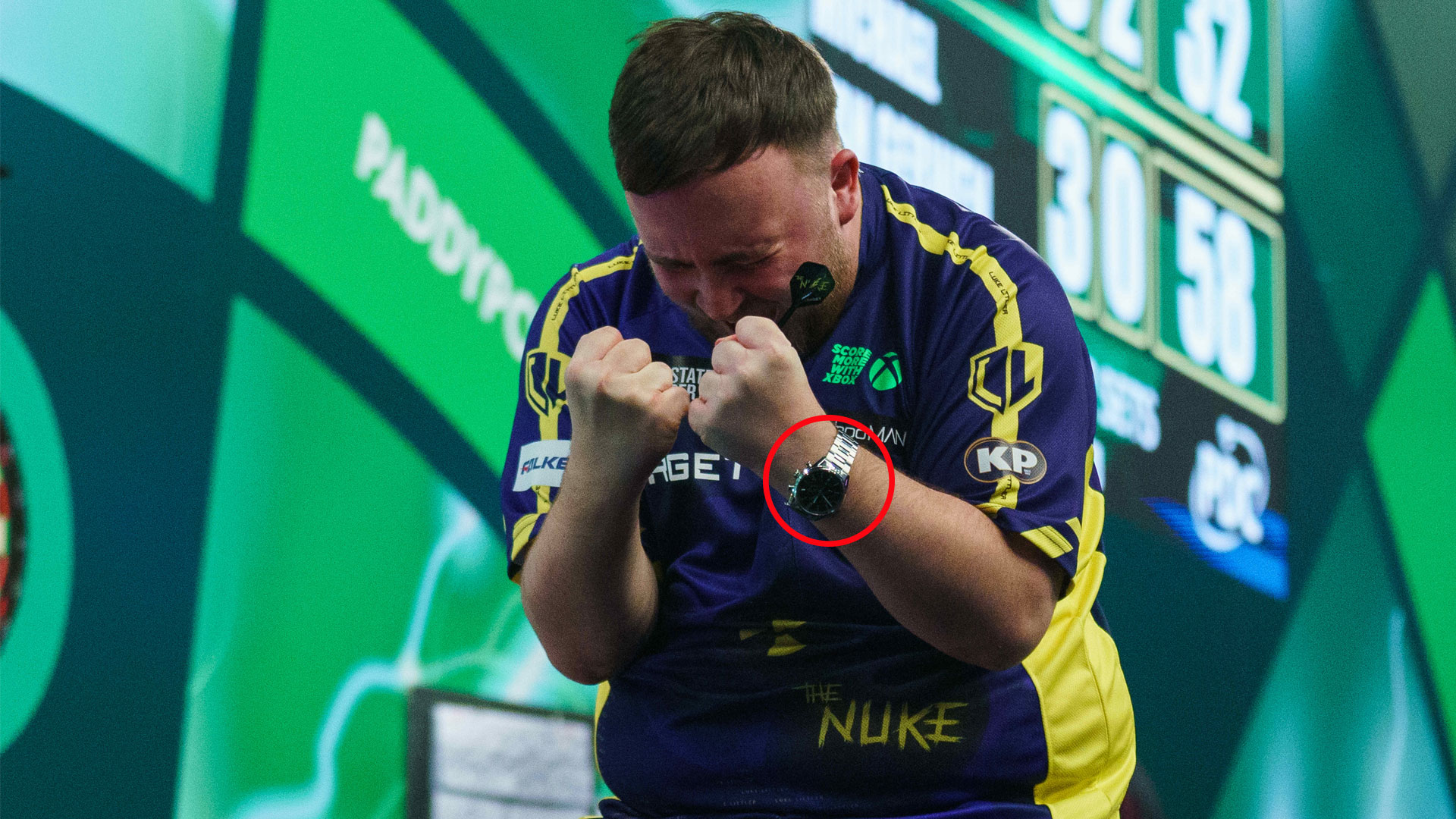 Luke Littler wears luxury £5,500 TAG Heuer watch during World Darts Championship demolition of Michael van Gerwen