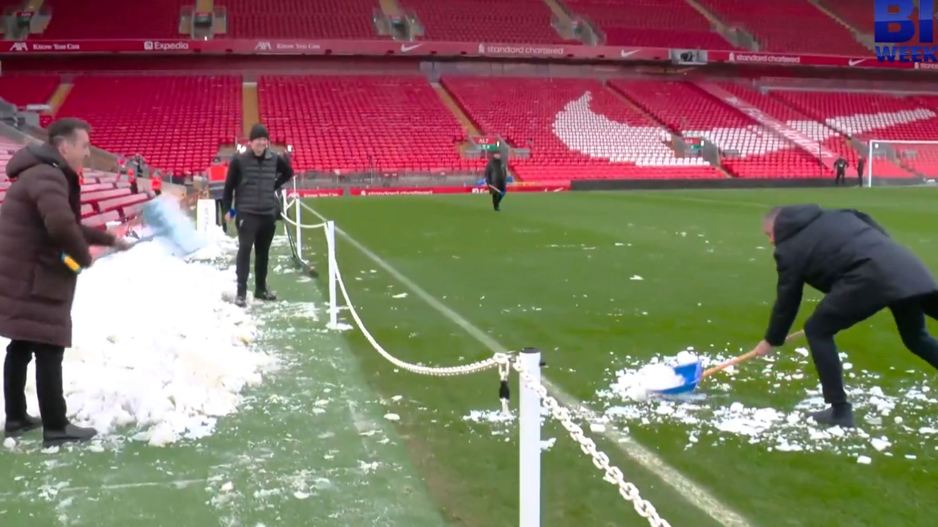 Gary Neville frantically shovels snow back ON to pitch as fans say Man Utd icon ‘doing his best to get match called off’