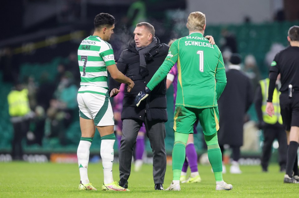 Celtic manager Brendan Rodgers with players Luis Palma and goalkeeper Kasper Schmeichel.