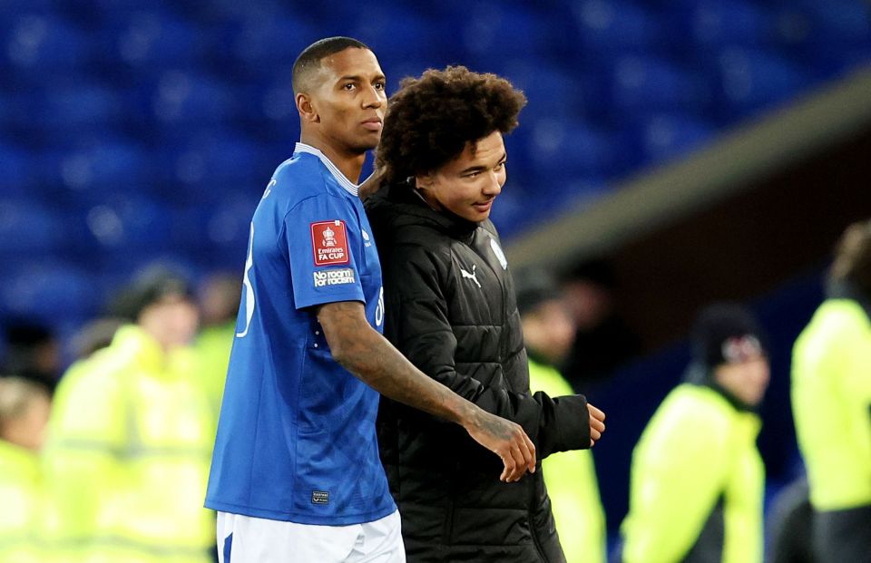 Ashley Young of Everton and his son Tyler Young of Peterborough United after a football match.